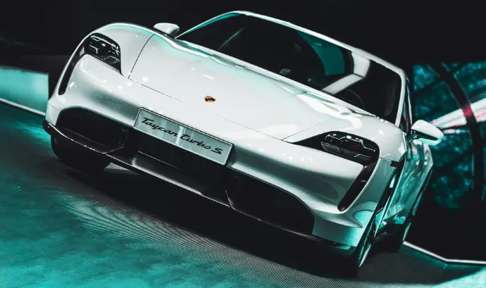 low-angle photography of white coupe